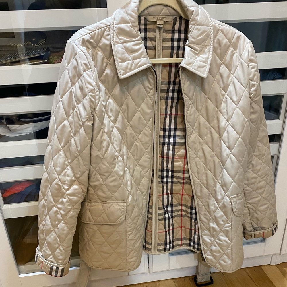 Light tan, Burberry, Brit jacket size medium with garment bag. Perfect condition